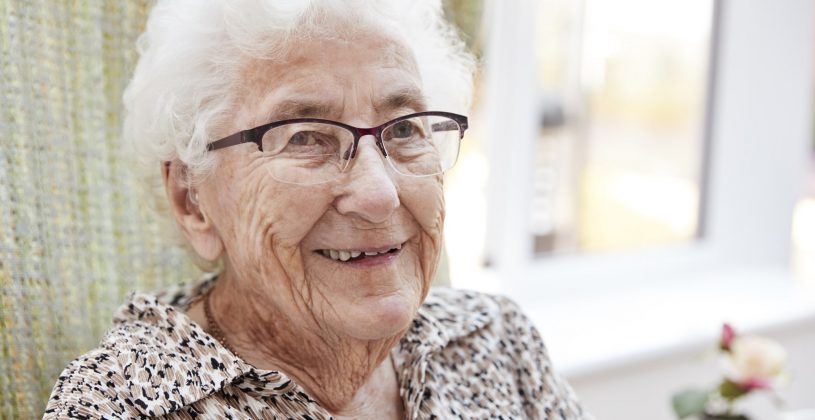 Happy senior at an assisted living community.